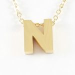 D1104-N  LETRA DORADA C/CAD