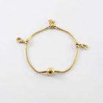 P2999  PULSERA CON DIJES DORADA