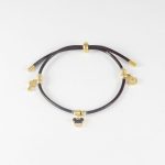 P3006  PULSERA CON DIJES DORADA